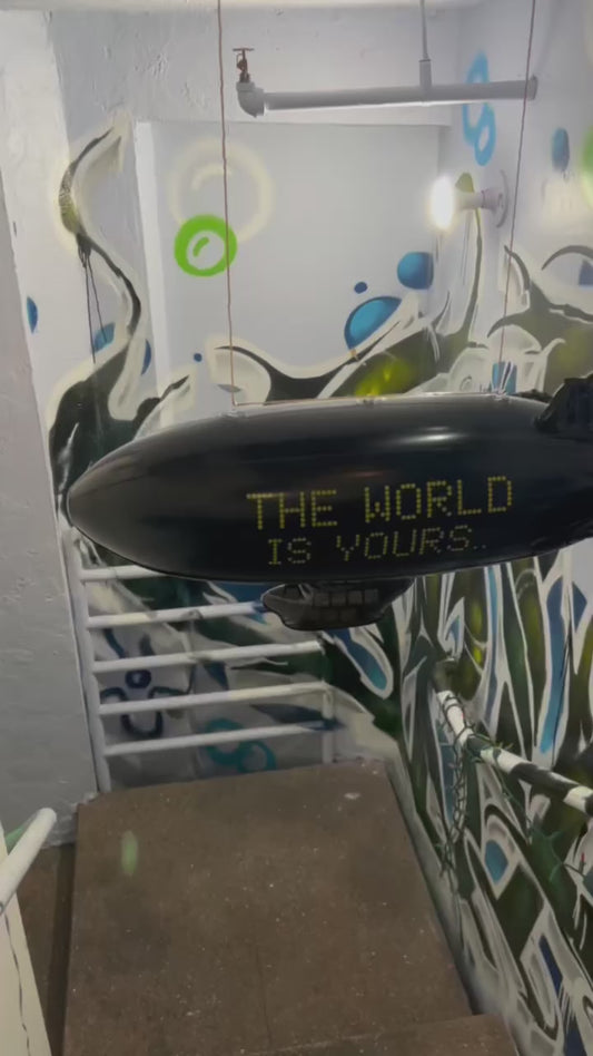 "BLIMP" THE WORLD IS YOURS